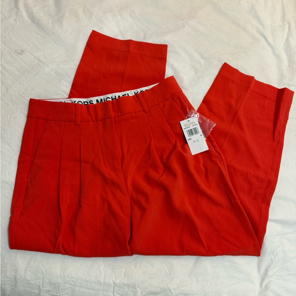 Michael Kors dress pants nwt
Size small 
Sea coral